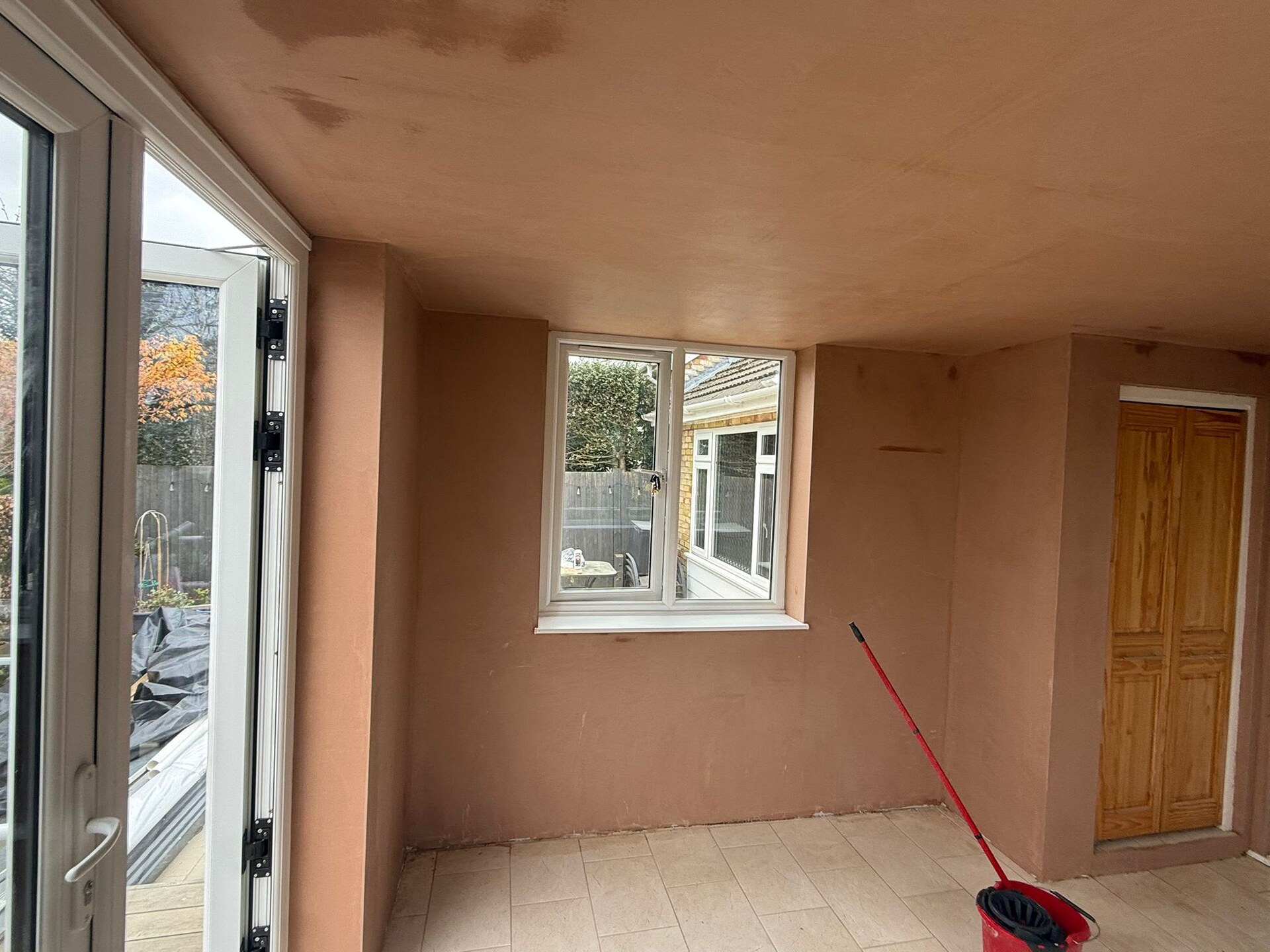 An artexed ceiling covered and finished flat
