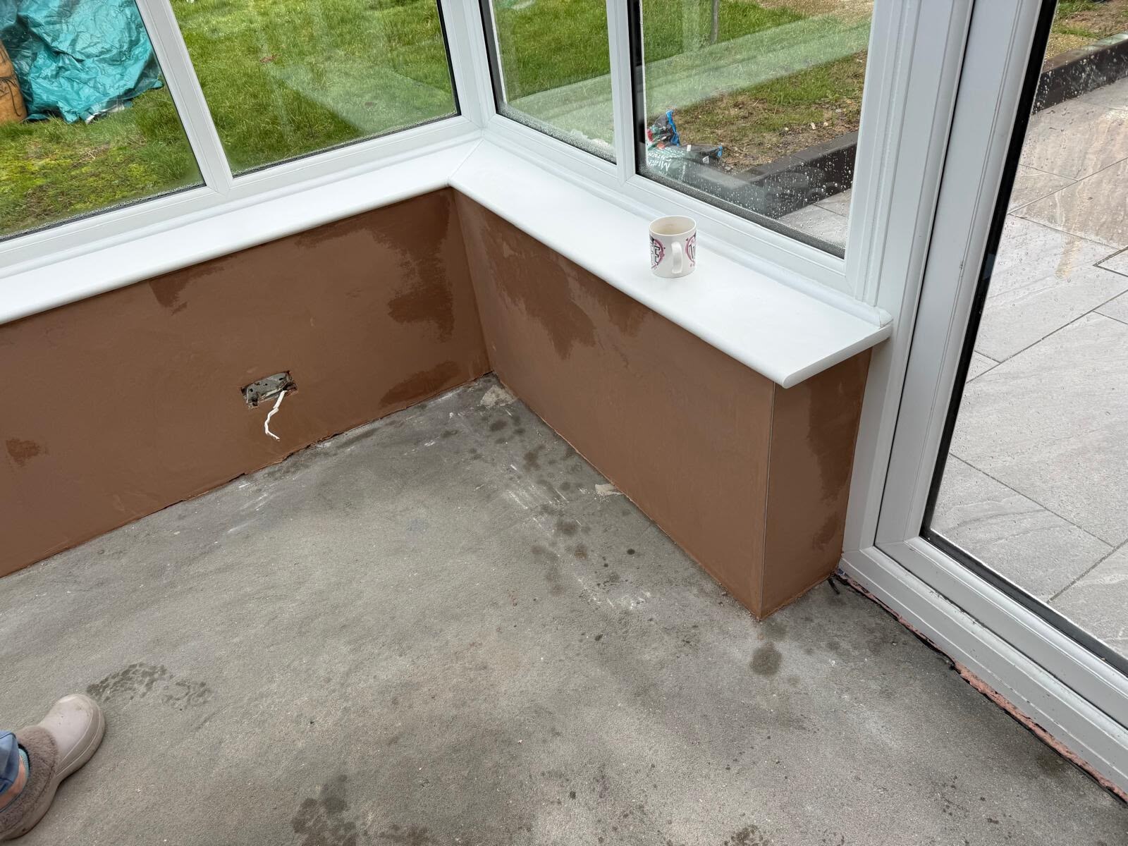 Plasterboard fixed to a stud wall ready for skimming