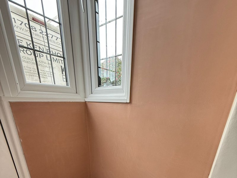 Freshly plastered window reveals squared off in a skimmed room